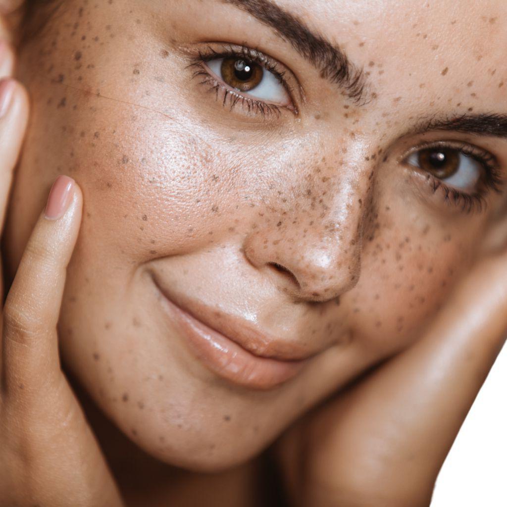 Woman applying the snail mucin essence to her face